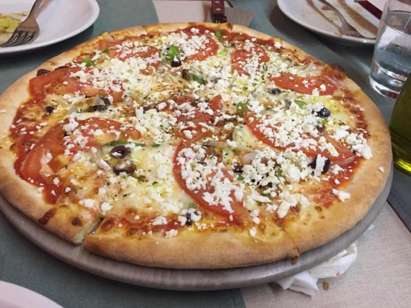Greek Pizza topped with Feta Cheese